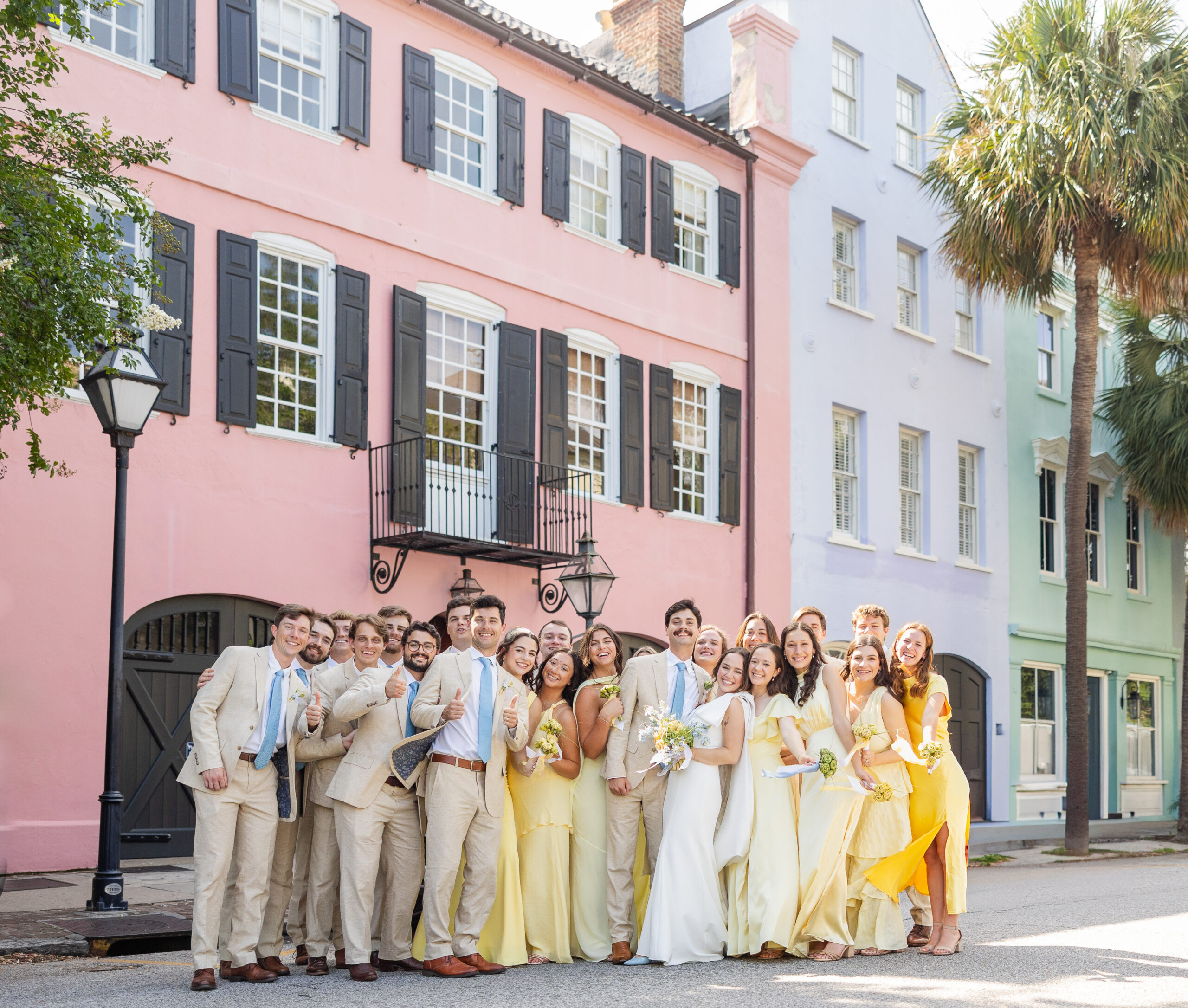 Catholic wedding party cheers on Rainbow Row in Charleston, SC