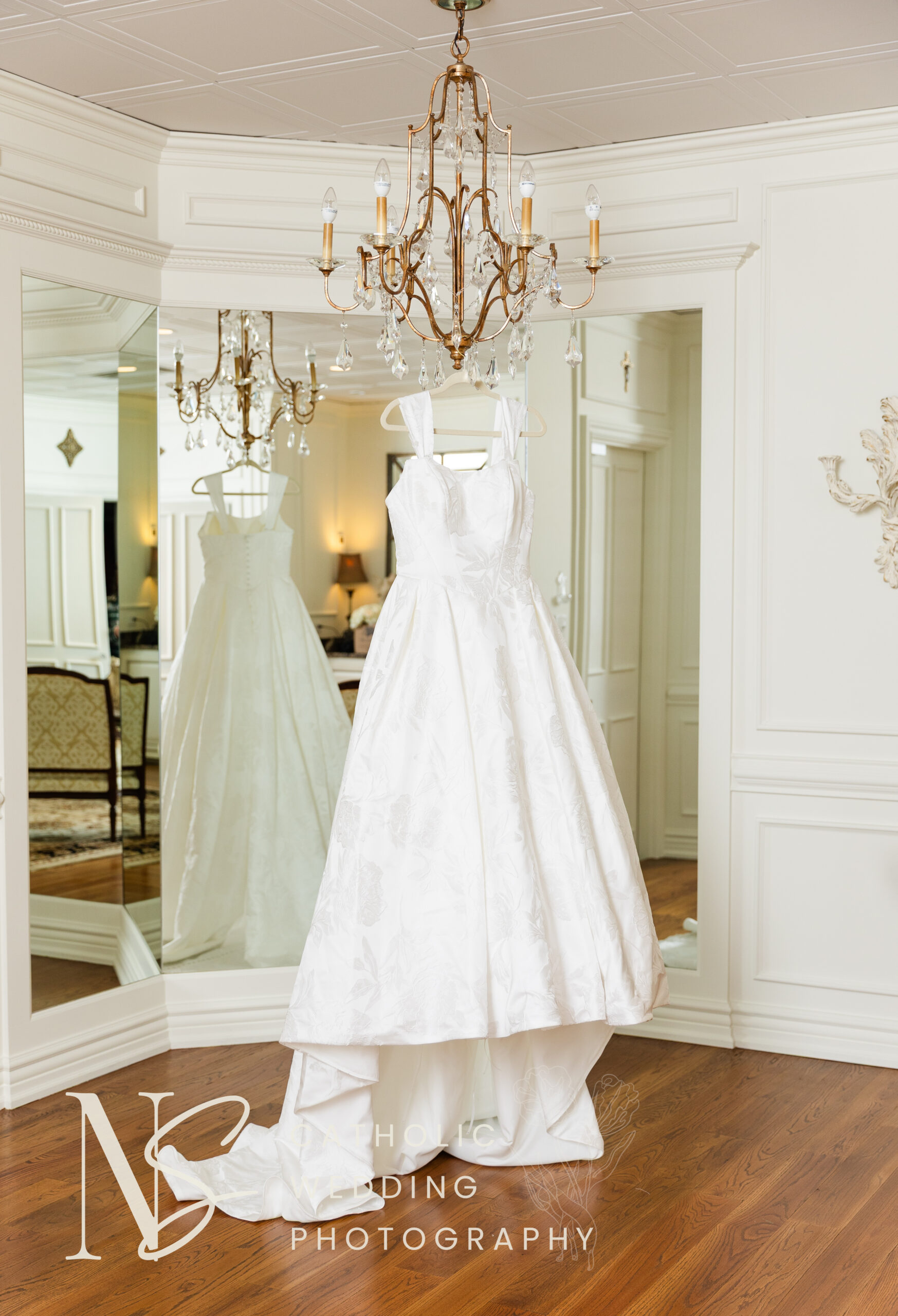 wedding dress hanging at bridal suite at Cathedral of Christ the King