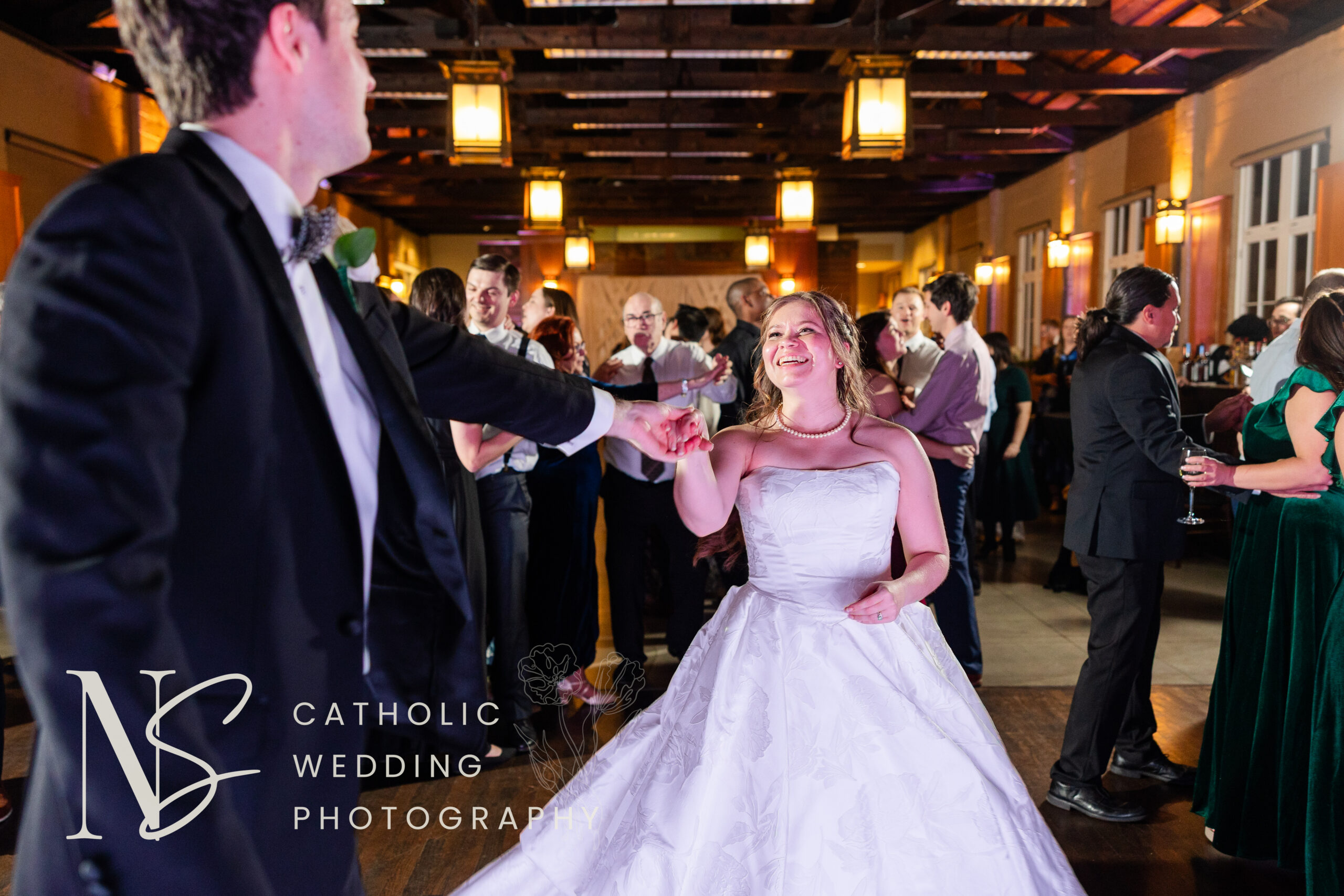 bride and groom dance at wedding reception at Magnolia Hall in Piedmont Park